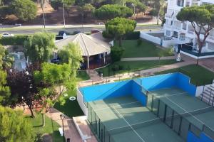 an overhead view of a building with a blue roof at El Portil Pinares in El Portil