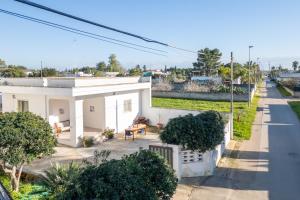 an aerial view of a white house at Villa Privata Spiaggia Del Sole in Porto Cesareo