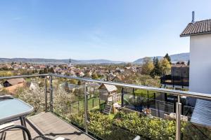 a balcony with a view of a city at Fewo Aida in Stockach