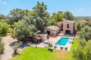 an aerial view of a house with a swimming pool at Son French in Algaida
