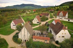 an aerial view of a village with buildings at Ferienwohnung Hogh, 55qm, Terrasse in Beuren