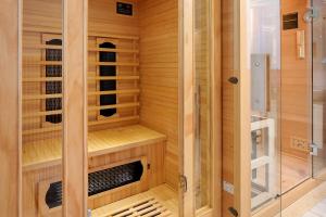 a wooden sauna with aventificialificialificialificialificialificialificialificialificial at Ferienwohnung Hörnleberg in Gutach im Breisgau +20 photos