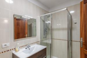 a bathroom with a sink and a shower at Luján 1a Entre Hogueras Y Luces in Puntallana +12 photos
