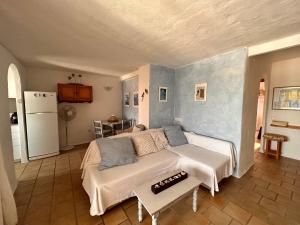 a bedroom with a large bed in a room at Casa Reija in Son Parc
