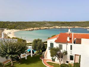 an aerial view of a house and a beach at Casa Reija in Son Parc