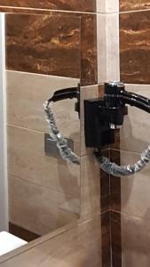 a chain hooked up to a wall with a wall at Villa Dehesa in Tabernas +37 photos