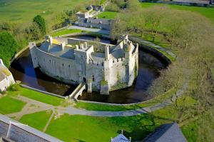 an aerial view of a castle in a river at Escapade Pirouaise - la Salicorne in Pirou