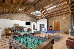 a large room with ping pong tables in it at Masa La Bomba in El Masnou