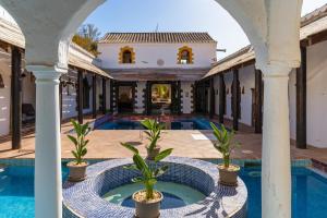 an external view of a villa with a swimming pool at Costa del Sol Retreat - 17 personas in Mijas