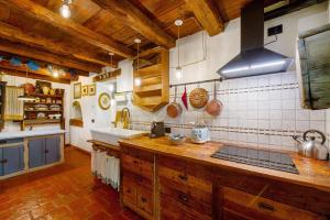 a kitchen with a sink and a counter top at Le Chalet du Coq Rouge in Valtournenche