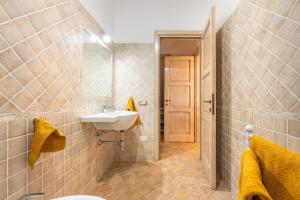 a bathroom with a sink and a mirror at Girasole 2 in Pula +18 photos