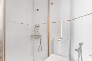 a bathroom with a shower and a toilet at Topete Alicante in Alicante +10 photos