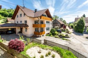 a house with a fence in front of it at Gala in Stockach
