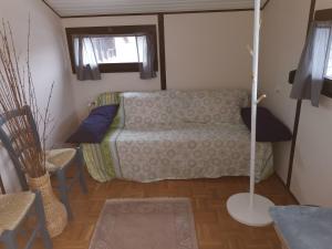 a living room with a couch and a table at Haus am Hennesee in Meschede