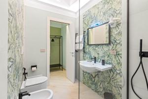 a bathroom with a sink and a mirror at Dimora Storica Lucia in Ascea +34 photos