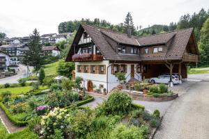 a house with a garden in front of it at Am Döttelbach in Bad Peterstal-Griesbach