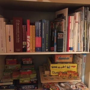 a book shelf filled with lots of books at Ferienhaus Seltschach 193 in Arnoldstein