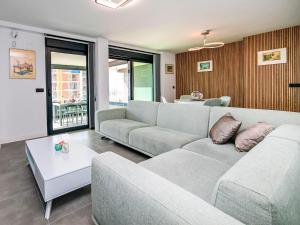 a living room with a couch and a table at Apartment Alexia by Interhome in Ifach
