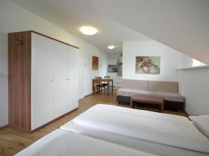 Postel nebo postele na pokoji v ubytování Aparthotel Fürst