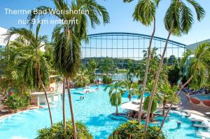 a view of the pool at the theme bad wolf whistler resort at Ferienwohnung Immenberg in Dirlewang