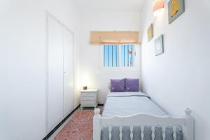 Llit o llits en una habitació de Casacamer N