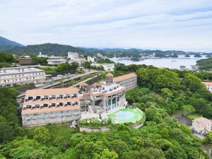 an aerial view of a city with a river and buildings at Toba Ocean Resort All-Inclusive Hotel in Toba