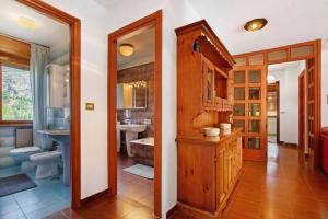 a bathroom with a toilet and a sink at Casa Lella Clemy in Aymavilles +28 photos