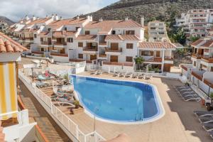 arial view of a building with a swimming pool at Atico cardon beach in Costa Adeje