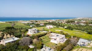 an aerial view of a large white house at Kos Dream Family Stay in Kos in Zipárion