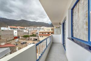 a balcony with a view of a city at Apartamento Retama in Adeje