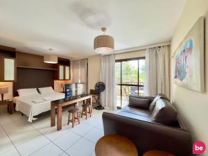 a living room with a couch and a table at Resort VG SUN por Be My Guest! in Paracumbuca +71 photos