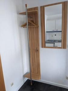 a room with a wooden shelf and a window at Appartement Karolina in Bad Soden-Salmünster +51 photos
