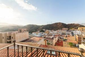 a view of a city with mountains in the background at Mccoy avenida 3 in Macael