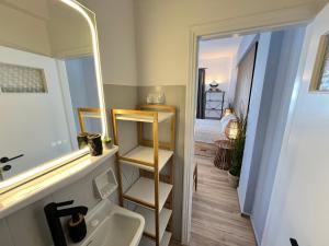 a bathroom with a sink and a mirror at aeolian blu 1 in Parikia +32 photos