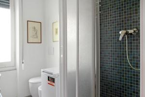 a bathroom with a shower and a toilet at La Solatia in Zoagli