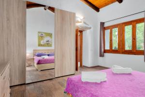 Llit o llits en una habitació de Suite Harmony