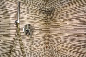 a shower with a fan in a bathroom at Solaria in Rapallo +32 photos