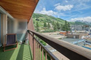 a balcony with a view of a mountain at 2 alpes in Les Deux Alpes