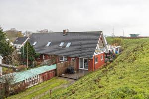 an aerial view of a house on a hill at Ferienwohnungen in Neufeld in Neufeld