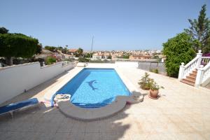 a swimming pool on top of a house at Casa Papa in San Fulgencio