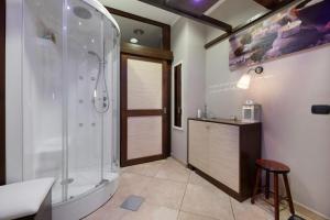 a bathroom with a shower and a sink at La Casa di Lu - Val D'Intelvi in Lanzo dʼIntelvi
