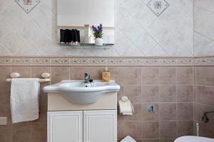 a bathroom with a sink and a toilet at Marazul in Tacoronte +17 photos