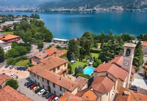 an aerial view of a town with a lake at Villa Wirnica Lake Como in Garlate