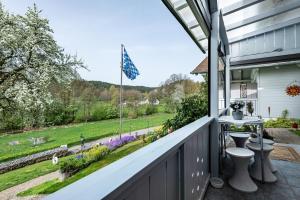 a balcony with a view of a yard at Ferienwohnung Plötz in Bad Koetzting