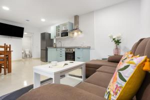 a living room with a couch and a table at Los Abuelos 2 Icod in Icod de los Vinos