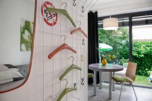 a room with a wall with footprints on it at Studio-in der atelierhaus Loft in Bodman-Ludwigshafen +12 photos