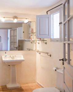 a bathroom with a sink and a toilet at Baix d' Or in Felanitx +23 photos