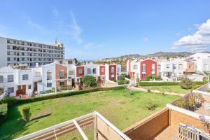arial view of a city with buildings and a yard at Casa Ramos Con Jacuzzi in Nerja