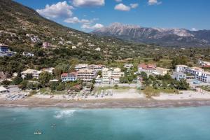 an aerial view of a resort on a beach at Apostolos Apartment 4 in Póndi