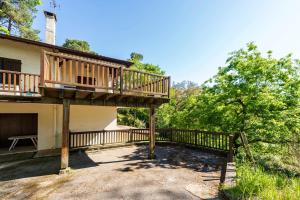 a large deck on the side of a house at Studio Proche Lac Hossegor in Hossegor
